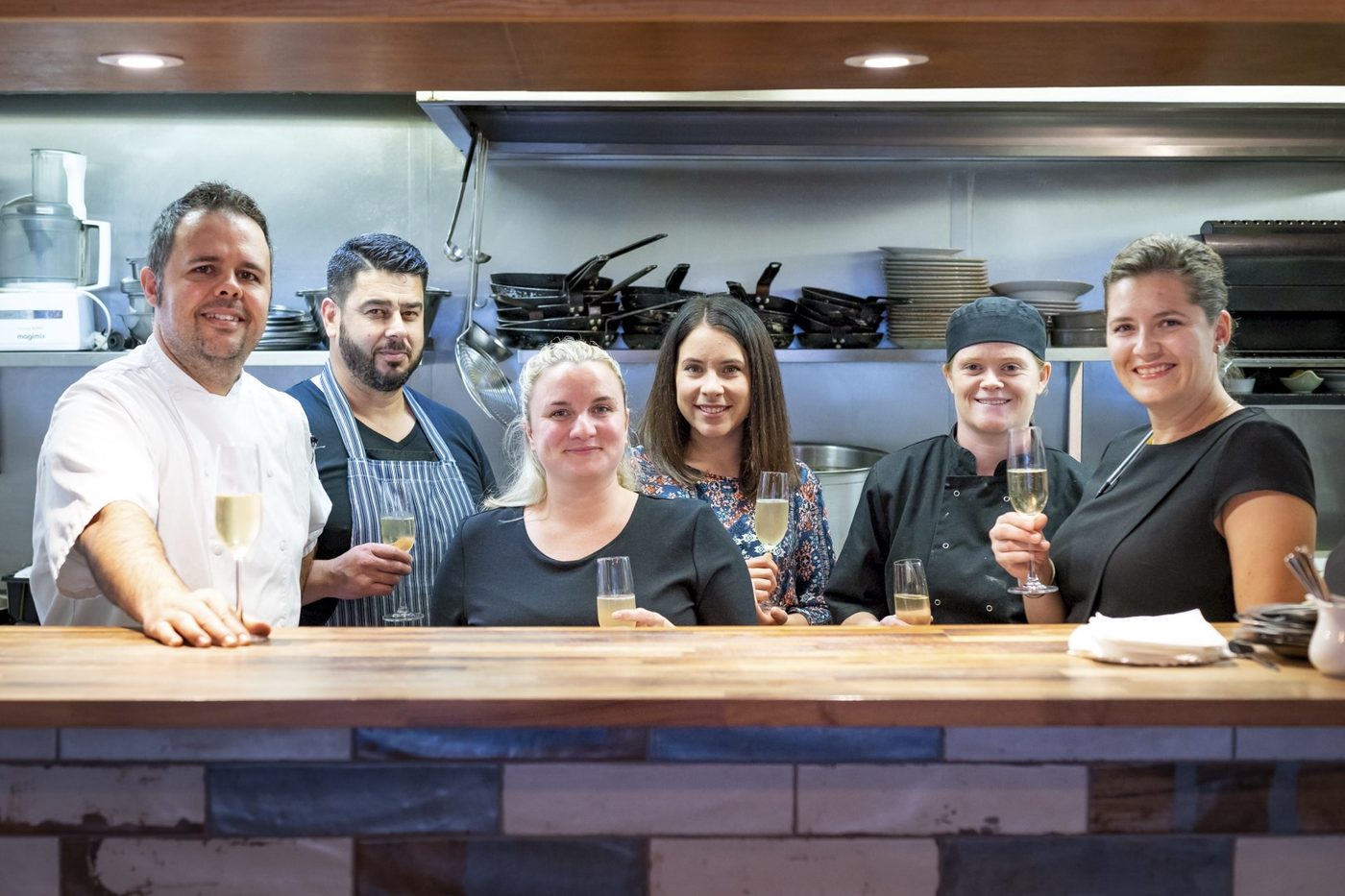 The kitchen team at the pass at Petit Pois